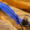 document and blue quill pen