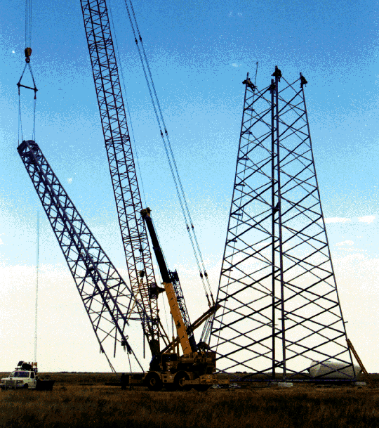 4 The top section of unit number one is lifted into place during tower assembly
